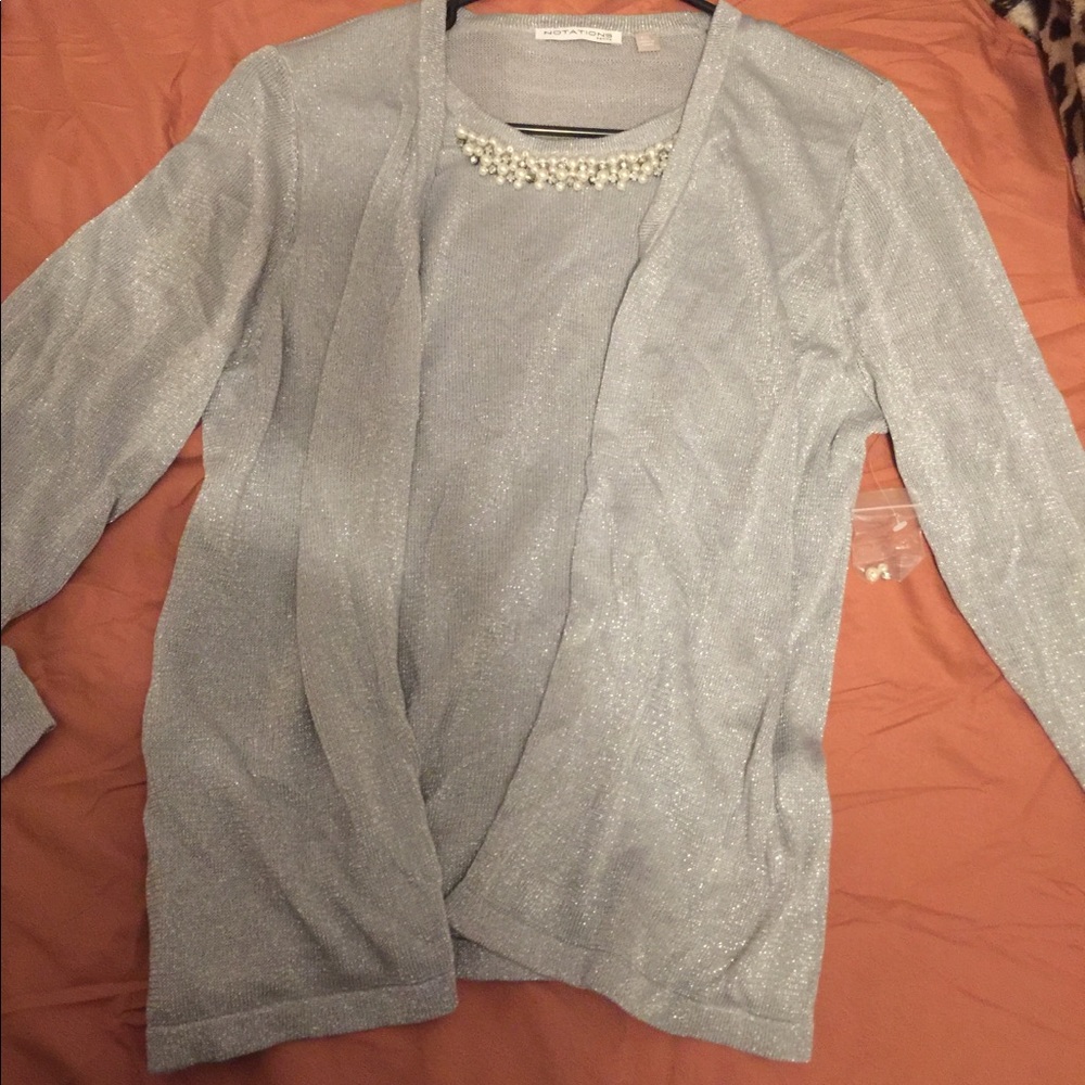 Very elegant grey top.
